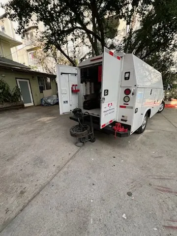 Magnet Plumbing service vehicle on-site for Water Heater Repair in Macdona